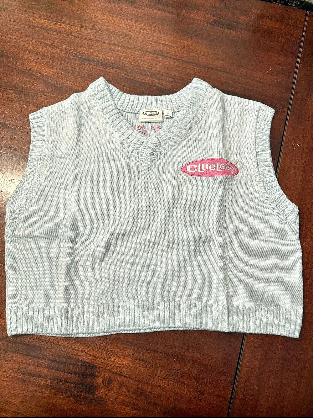 Clueless Light Blue Sweater Vest Size Medium
New without tags